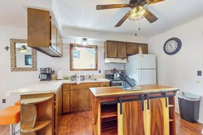 Fridge, microwave, oven, stovetop - Water front home on canal with large patio, space for boat, & gas grill (Indian River)