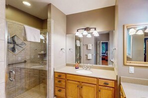 Shower, hair dryer, towels - Luxury home with forest views, fireplace, deck, streaming, & washer/dryer (Glen Arbor)