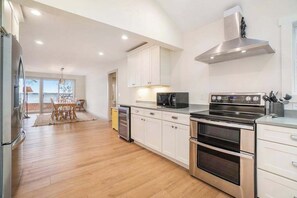 Fridge, microwave, oven, stovetop - Newly remodeled lake house with amazing views, dock, firepit & vibrant interior (Honor)