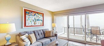 Bayfront condo with lake & bay views, deck, 2 fireplaces, private washer/dryer