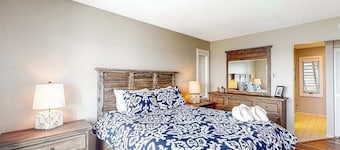 Bayfront condo with lake & bay views, deck, 2 fireplaces, private washer/dryer