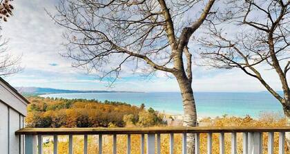 Updated condo in Glen Arbor with Lake Michigan views, fireplace, deck, W/D