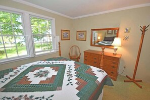 4 bedrooms, WiFi, bed sheets - Lakefront home on Little Glen Lake with fireplace, deck, gas grill, and firepit (Empire)