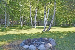 Property grounds - Lakefront home on Little Glen Lake with fireplace, deck, gas grill, and firepit (Empire)