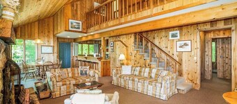 Rustic dream-home w/ lake views, wraparound deck, & wood-burning fireplace