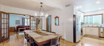 Dog-friendly home in the perfect location with enclosed yard, streaming, & W/D