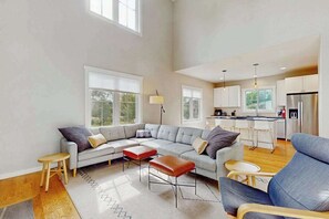 TV, fireplace - Newly-built home on a grassy lot with washer/dryer & screened deck (Sawyer)