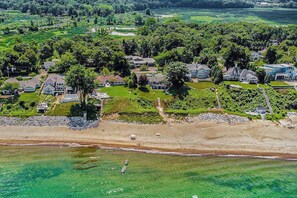 On the beach - Luxury Lakefront Home w/ Private Hot Tub, Large Yard, Association Beach & WiFi (New Buffalo)