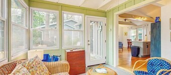 Dog-friendly cottage with private beach, screened porch, wood fireplace & AC
