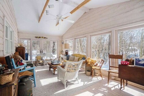 Inviting dog-friendly home with Lake Michigan views & charming sunroom