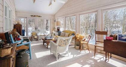 Inviting dog-friendly home with Lake Michigan views & charming sunroom