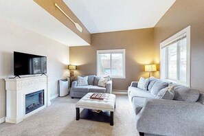 TV, fireplace, offices - Charming in Town Home w/ Backyard Patio, Fire Pit, just steps from Indian River! (Indian River)