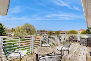 Outdoor dining - Stylish dog-friendly retreat with furnished deck, pool, & firepits (Douglas)