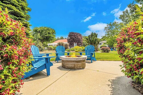 Stylish dog-friendly retreat with furnished deck, pool, & firepits