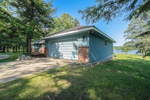 Exterior - Quaint waterfront home with beach, dock, sweeping views, fast WiFi & W/D (Lake Leelanau)