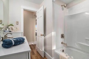 Shower, towels - Quaint waterfront home with beach, dock, sweeping views, fast WiFi & W/D (Lake Leelanau)
