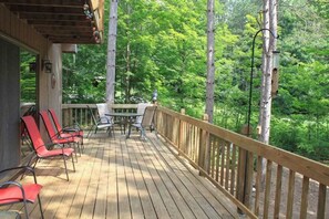 Outdoor dining - Stunning two-story home in the trees w/ a firepit, furnished deck, & balcony (Thompsonville)