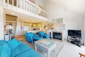 TV, fireplace, DVD player - Riverfront condo near the lake with beach access, fireplace, balcony & cable (Glen Arbor)