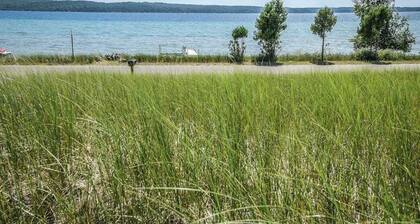 Rustic getaway on Crystal Lake w/ firepit, guest house & private dock