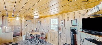 Rustic getaway on Crystal Lake w/ firepit, guest house & private dock