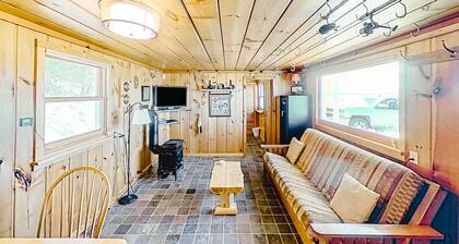 Rustic getaway on Crystal Lake w/ firepit, guest house & private dock