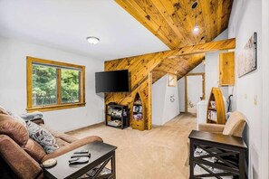 TV, fireplace, offices - Waterfront home on Betsie River with hot tub & sauna near skiing at Crystal Mtn (Thompsonville)