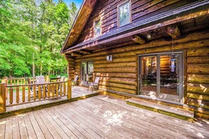 Outdoor dining - Waterfront home on Betsie River with hot tub & sauna near skiing at Crystal Mtn (Thompsonville)