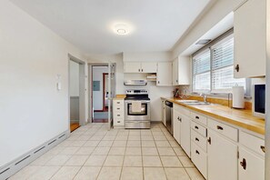 Fridge, microwave, oven, stovetop - Lovely home with hot tub, pool, two kitchens, enclosed backyard, firepit & grill (New Buffalo)