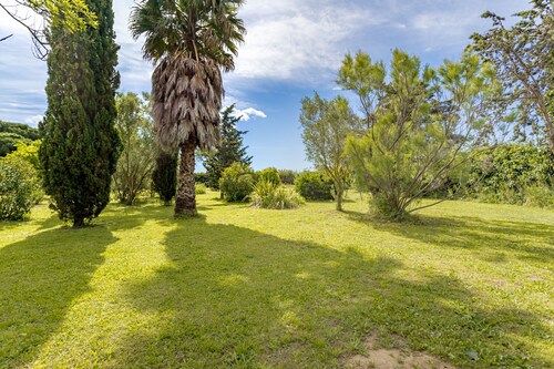 Apartment Near the Sea with Mountain View, Private Terrace, and Wi-Fi