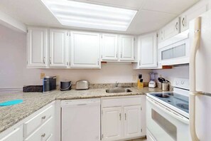 Fridge, microwave, oven, stovetop - Oceanfront Condo w/ Balcony & Amazing Beach Views (Ocean City)