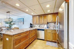 Fridge, microwave, oven, stovetop - Beachfront condo with ocean-view balcony, outdoor pool, washer/dryer & AC (Ocean City)