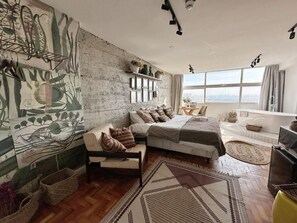 Apartamento, vista para a cidade | Área de estar