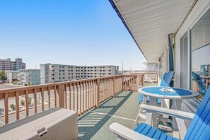 Outdoor dining - Third-Floor Ocean View Condo w/Private Balcony, Beach Access, Free WiFi, A/C (Ocean City)
