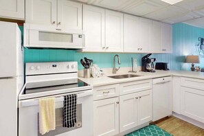 Fridge, microwave, oven, stovetop - Ocean-view condo with balcony & pool access - steps from the beach (Ocean City)