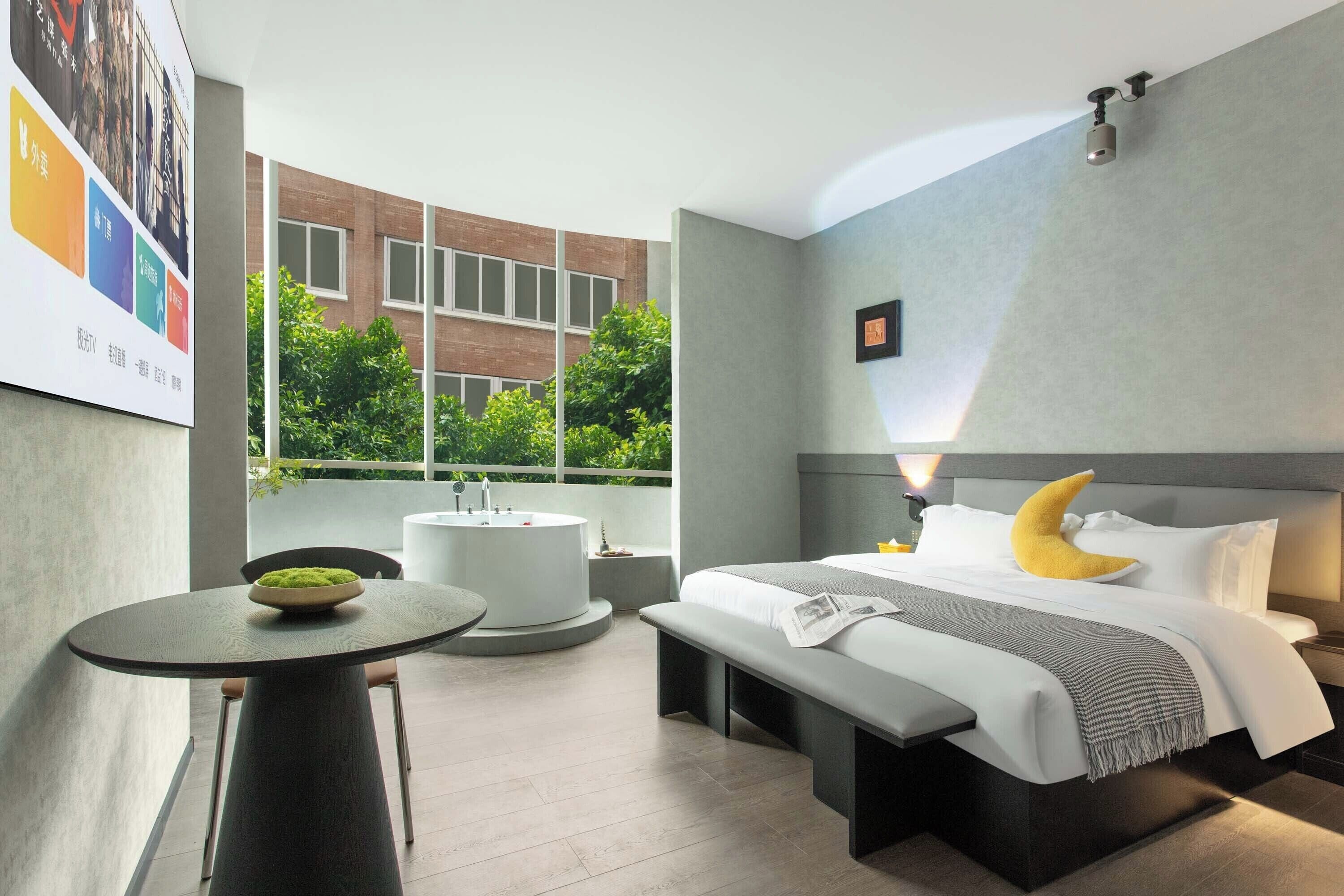 Senior Double Room, City View | Laptop workspace, blackout drapes, soundproofing, iron/ironing board