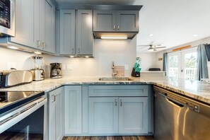 Fridge, microwave, oven, stovetop - Newly-renovated, waterfront retreat w/ a furnished deck - walk to the beach (Ocean City)