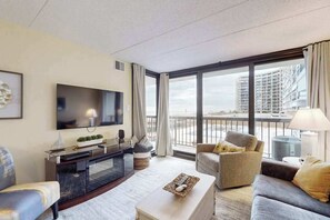 TV, fireplace, table football, offices - Ocean-view 1st-floor condo with electric fireplace, pools & gym (Ocean City)