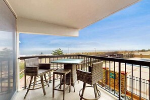 Outdoor dining - Ocean-view 1st-floor condo with electric fireplace, pools & gym (Ocean City)