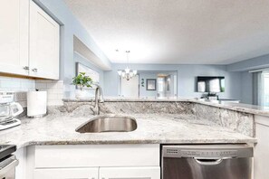 Fridge, microwave, oven, stovetop - Wonderful coastal escape with pools, deck & central AC - near shops & dining (Ocean City)