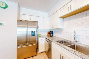 Fridge, microwave, oven, stovetop - Ultimate beach getaway with ocean view, open layout, garage parking, & streaming (Ocean City)