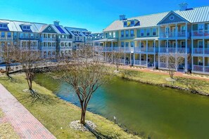 Exterior - Large, welcoming house steps from bay w/water view, WiFi, AC, shared pool, & W/D (Ocean City)