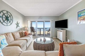 TV, DVD player, offices - Oceanfront Pelican Beach condo with sunrise ocean views, AC, laundry & WiFi (Ocean City)