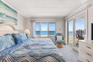 2 bedrooms, iron/ironing board, WiFi, bed sheets - Oceanfront Pelican Beach condo with sunrise ocean views, AC, laundry & WiFi (Ocean City)
