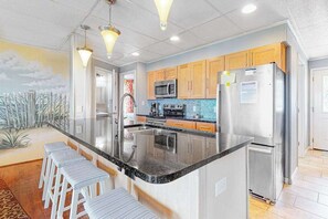 Fridge, microwave, oven, stovetop - Oceanfront Happy House duplex with WiFi, W/D, ocean views, & beach access (Ocean City)