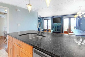 Fridge, microwave, oven, stovetop - Oceanfront Happy House duplex with WiFi, W/D, ocean views, & beach access (Ocean City)