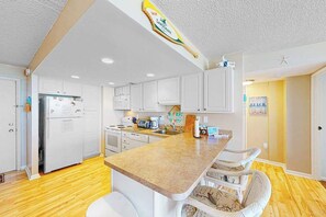 Fridge, microwave, oven, stovetop - Gorgeous oceanfront condo with pool, central AC, WiFi, balcony water views (Ocean City)