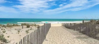 Cozy ground-floor condo w/community pool & furnished patio - walk to the beach