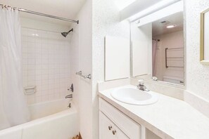 Shower, hair dryer, towels - Oceanfront Condo with Covered Balcony, WiFi, AC, Laundry & Shared Pool (Ocean City)