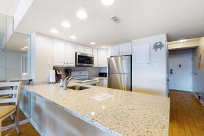 Fridge, microwave, oven, stovetop - Beachfront corner condo with balcony, views, pools, game room, gym & sauna (Ocean City)