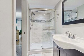 Shower, towels - Up-to-Date, Oceanfront Condo with Balcony, AC, WiFi, Laundry & Shared Pool (Ocean City)